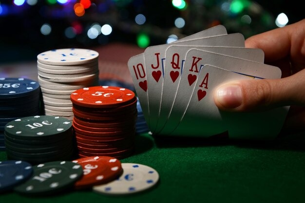 Live dealer rolling dice in Super Sic Bo game